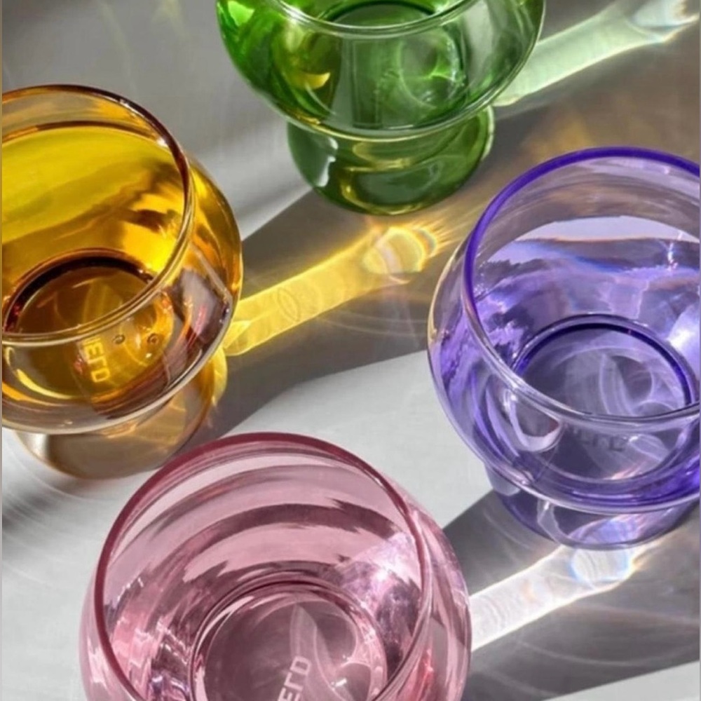 Yield Millennium Collection set of 4, stemless glasses - new.